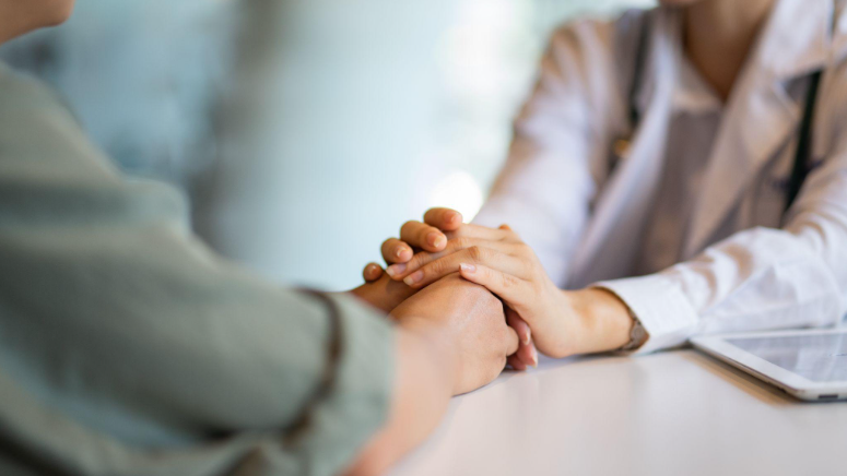 What Is a Patient Assistance Program (PAP) and Who Qualifies? | Hands clasped and holding together